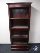 A set of hardwood open bookshelves