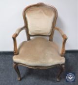A continental salon armchair in dralon fabric