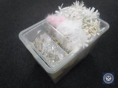 A crate of Christmas decorations, illuminated castle ornament, decorative glass drops, etc, etc.