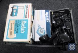 A box of Hanimex projector and three retro style telephones