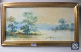 A gilt framed oil on board depicting fisherman, signed T.