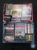 Two crates containing a quantity of VHS tapes.