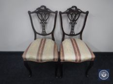 A pair of Victorian mahogany dining chairs