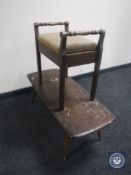 An Ercol coffee table and an Edwardian piano stool