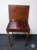 A continental mahogany work table