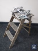 A small pair of wooden stool steps and two pairs of vintage taps