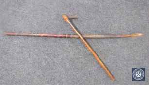 A tribal spear and axe