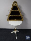 A white and gilt wine table and a gilt wall shelf
