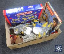 A box containing Meccano