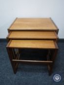 A nest of three G Plan teak tables