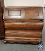 A 19th century oak bureau,