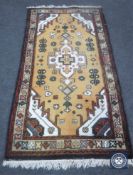 A Caucasian design rug,