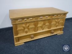A pine blanket chest fitted a drawer