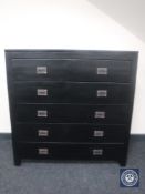 A Chinese style double door wardrobe in a black finish