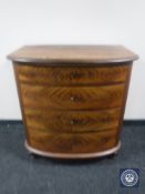 A 19th century continental mahogany bow fronted four drawer chest