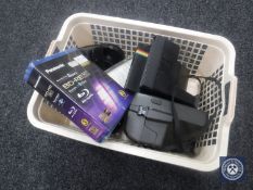 Two Polaroid instant cameras, lenses, lens caps, etc.