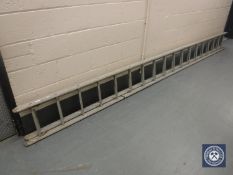 An aluminium extension ladder