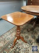 A Victorian pedestal tripod table, with square top,