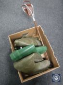 Two pairs of fishing waders and a shooting stick