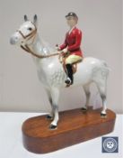 A Beswick figure of a Huntswoman on grey horse, 1730,