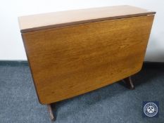 A teak G PLan drop leaf table