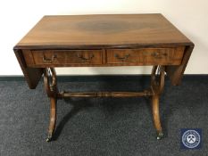 A mahogany sofa table fitted two drawers