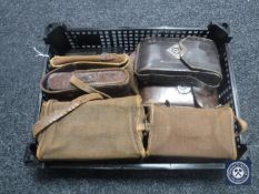 A box of assorted vintage cameras