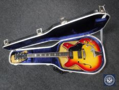 A vintage Japanese made Commodore electric guitar in carry case