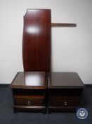 A pair of Stag Minstrel glass topped bedside stands fitted a drawer together with a headboard
