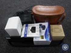 A tray of Royal Doulton picture frame, dash cam, two pairs of binoculars,