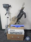 A box containing Super 8 camera and tripod, set of drain rods, security light,