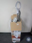 A Shark Lift Away steam mop and a lamp