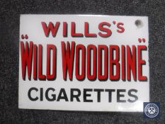 An early 20th century double sided enamel sign 