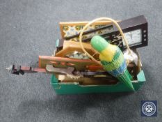 A box of wall clocks, barometer, framed tiled panel,