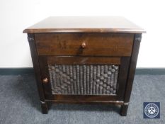 A contemporary bedside cabinet fitted a drawer