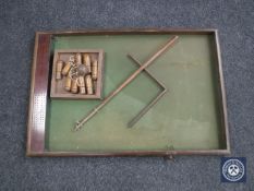 An early 20th century counter top bar skittles game