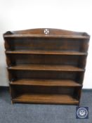 A set of early twentieth century oak open bookshelves