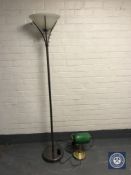 A contemporary chrome uplighter together with a banker's desk lamp