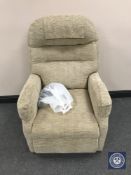 An electric reclining armchair