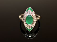 An 18ct white gold emerald and diamond ring,