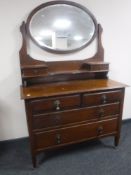 An Edwardian mahogany dressing chest