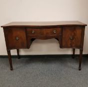 A 19th century serpentine fronted sideboard,