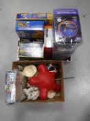 Two boxes containing anatomical skeleton, rock tumbler,