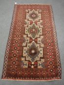 A Baluchi rug 190 cm x 102 cm