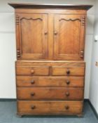 A Victorian mahogany press, width 131 cm.