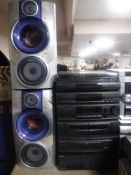 A Sony hifi system together with a pair of Aiwa subwoofer three-way speakers