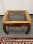 A 20th century Chinese glass topped lamp table,