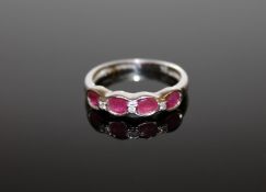 A 9ct white gold ruby and diamond ring,
