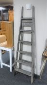 A set of vintage folding wooden steps