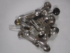 A collection of twenty-four Georgian and later silver salt and mustard spoons